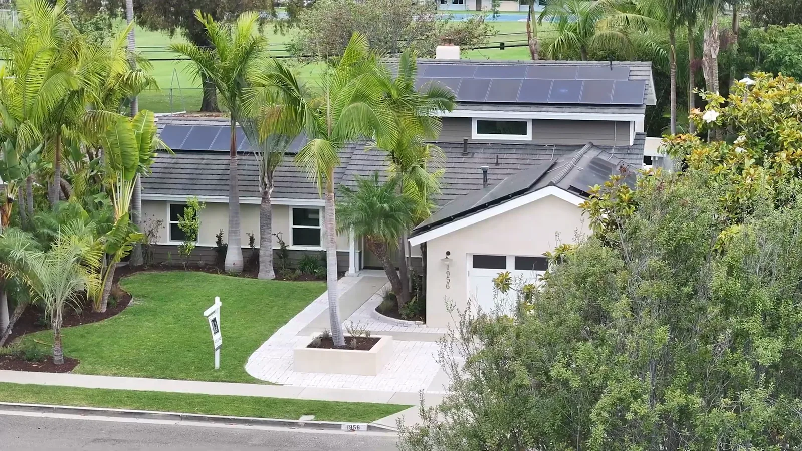 Listing film moving from a drone reveal into the home